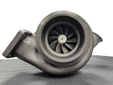 Turbocharger on a gray surface with a white background