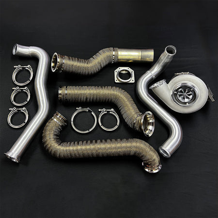 Collection of automotive exhaust pipes and components on a black background
