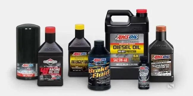 A lineup of various ZNMOIL automotive and motorcycle lubricants and fluids, including Racing Oil, Brake Fluid, Diesel Oil, and Synthetic Motor Oil, displayed on a light gray background.