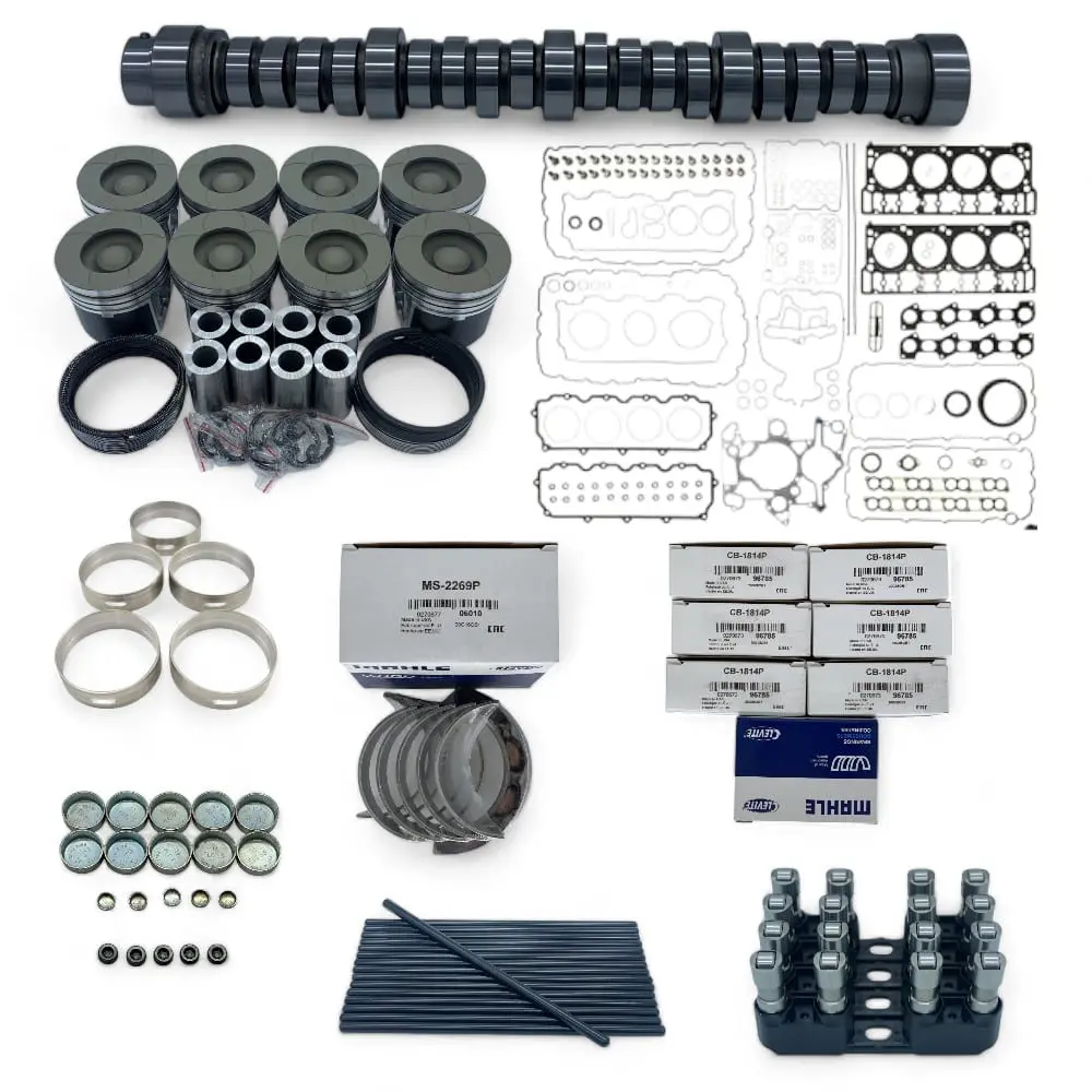 Engine parts and gaskets laid out systematically.