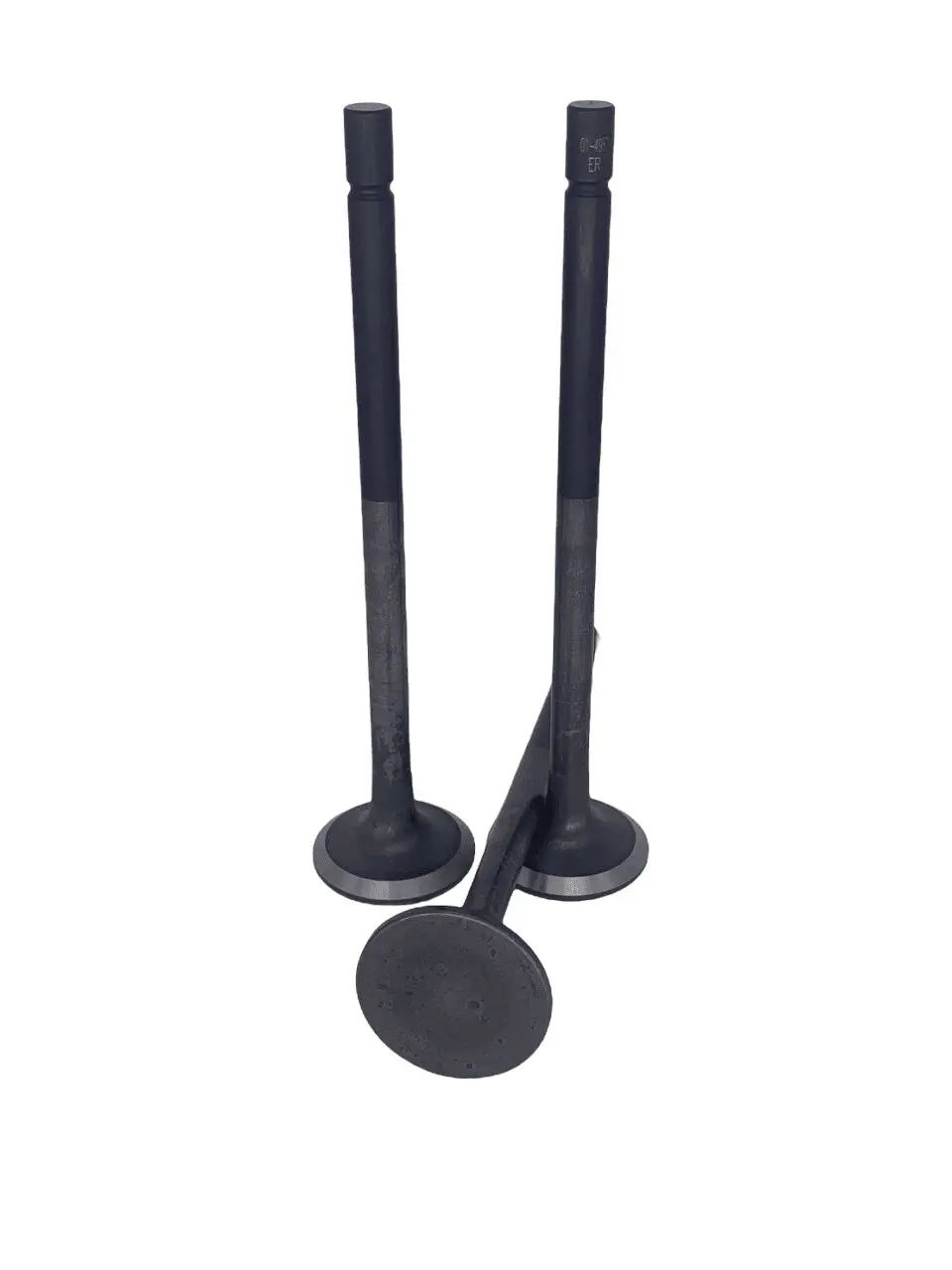 Three black engine valves on white background.