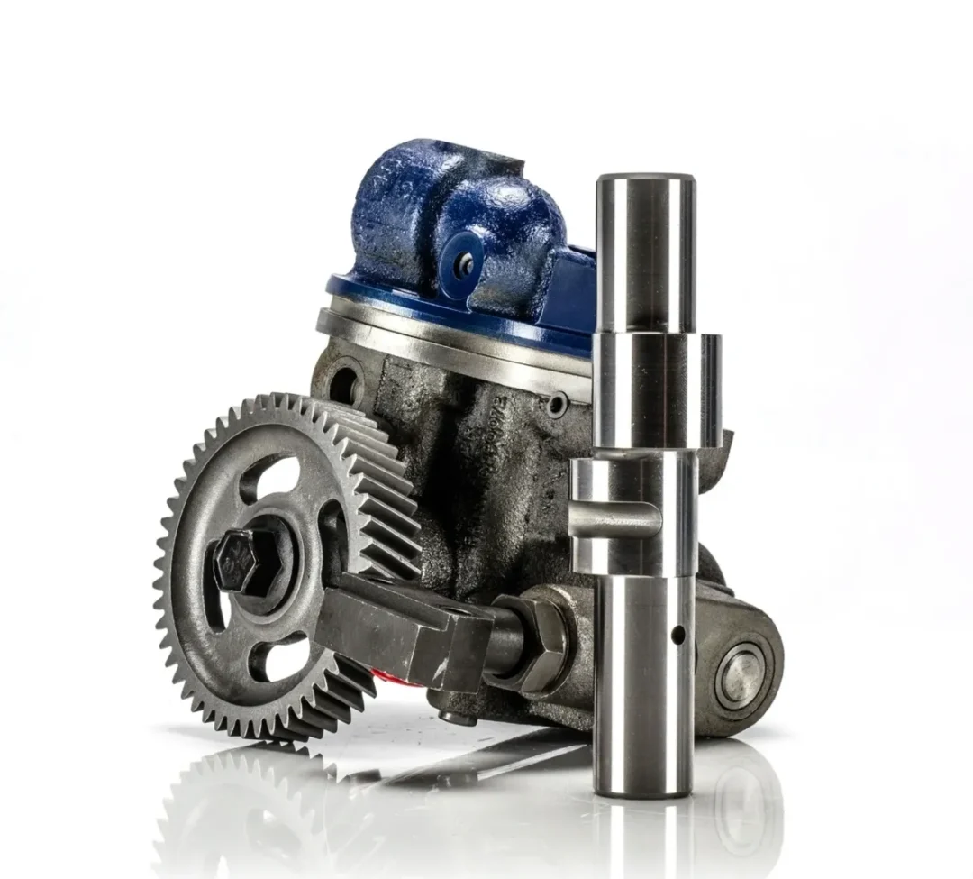 A close-up of mechanical components including gears and a shaft.